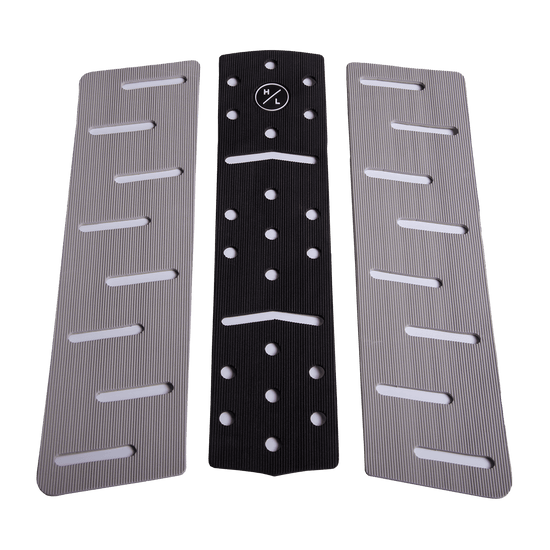 The HL Front Mid Size Corduroy Pad has three striped fan-shaped panels with slots on black.