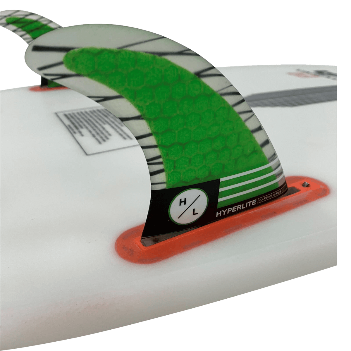 Close-up of the 4.5 RIOT Carbon Surf Fin Kit with RTM construction and green/black stripes.