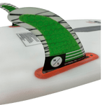 Close-up of the 4.5 RIOT Carbon Surf Fin Kit with RTM construction and green/black stripes.
